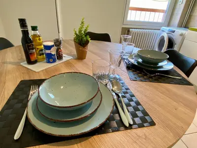 Coin salon dans l'établissement Appartement Le lion