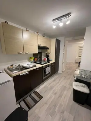 Cuisine ou kitchenette dans l'établissement Au cœur des Vosges