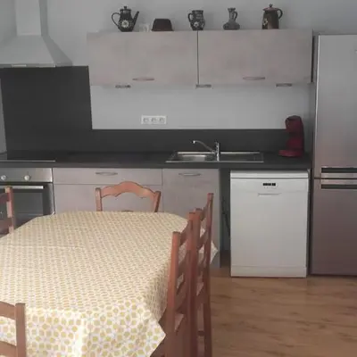 Cuisine ou kitchenette dans l'établissement Chez Delphine