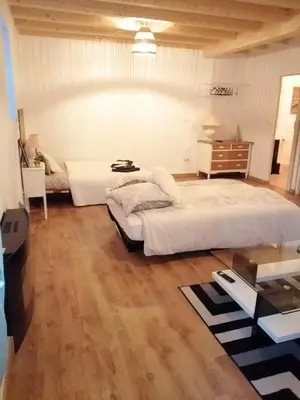 Un ou plusieurs lits dans un hébergement de l'établissement Le Noyer: Petit chalet cosy proche de Mulhouse