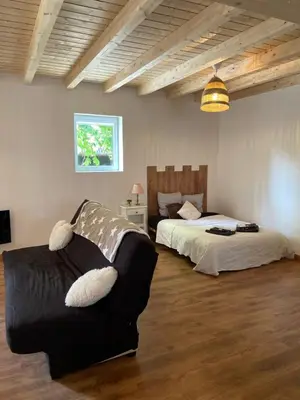 Un ou plusieurs lits dans un hébergement de l'établissement Le Noyer: Petit chalet cosy proche de Mulhouse