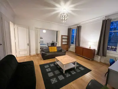 Coin salon dans l'établissement Chambres privées -Private room- dans un spacieux appartement - 100m2 centre proche gare