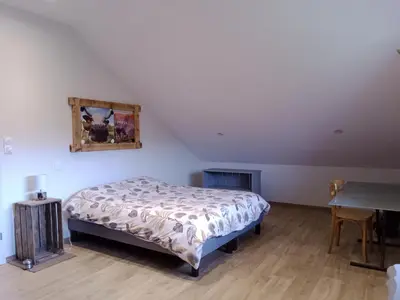 Un ou plusieurs lits dans un hébergement de l'établissement Gîte au pied du Mont