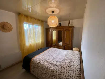 Un ou plusieurs lits dans un hébergement de l'établissement Un petit coin de bonheurs Maison entière classée 3 étoiles