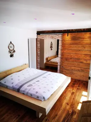 Un ou plusieurs lits dans un hébergement de l'établissement MONTAGNE-LAC&SPA (jacuzzi privé) (NOUVEAU)