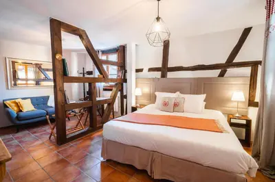 Un ou plusieurs lits dans un hébergement de l'établissement Les Suites - La Cour St Fulrad