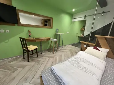 Un ou plusieurs lits dans un hébergement de l'établissement Le Domaine du Verger, Chambres d'Hôtes