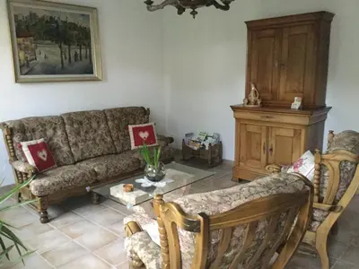 Coin salon dans l'établissement Gîte du Moulin