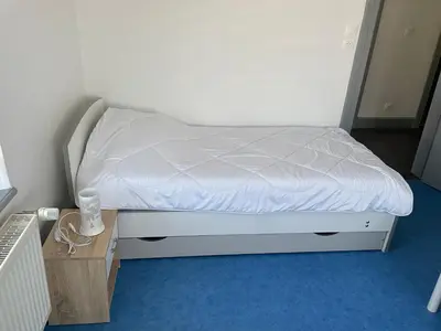 Un ou plusieurs lits dans un hébergement de l'établissement Appartement saisonnier