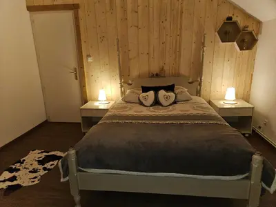 Un ou plusieurs lits dans un hébergement de l'établissement Gite Eglantine 2 à 6 personnes avec SPA et salle de jeux dans la résidence
