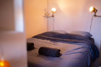 Un ou plusieurs lits dans un hébergement de l'établissement Studio cosy au cœur de Jaurès