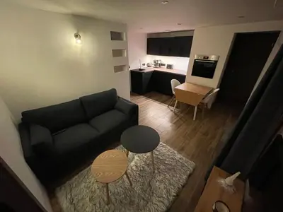 Télévision ou salle de divertissement dans l'établissement Le gîte cozy de Bouvacôte avec vue panoramique et Sauna
