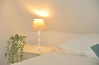 Un ou plusieurs lits dans un hébergement de l'établissement L'Hirondelle - Charming flat -