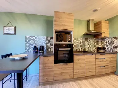 Cuisine ou kitchenette dans l'établissement Chez Nat&Mat- Colmar gare- Parking gratuit