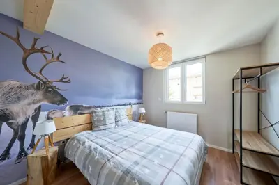 Un ou plusieurs lits dans un hébergement de l'établissement Le SCANDINAVE Centre Ville/2 chambres + Terrasse