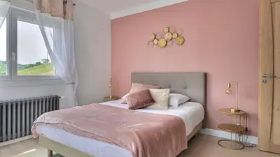 Un ou plusieurs lits dans un hébergement de l'établissement Evasion 4 étoiles Spa privé aux Libellules 12 pers Montagne Vosges