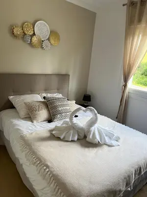Un ou plusieurs lits dans un hébergement de l'établissement Evasion 4 étoiles Spa privé aux Libellules 12 pers Montagne Vosges