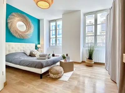 Un ou plusieurs lits dans un hébergement de l'établissement Le convivial, appartement Centre ville Mulhouse