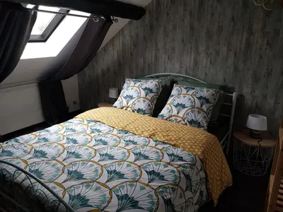 Un ou plusieurs lits dans un hébergement de l'établissement Cosy Lodg