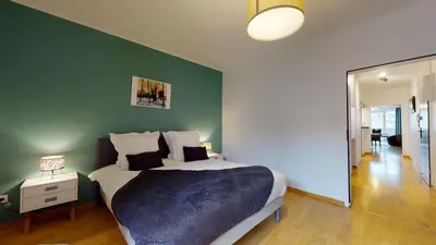 Un ou plusieurs lits dans un hébergement de l'établissement Le Nid Cosy + 1 Garage