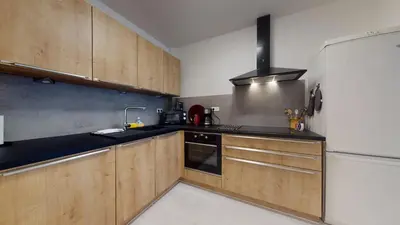 Cuisine ou kitchenette dans l'établissement Le Nid Cosy + 1 Garage