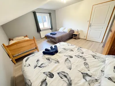 Un ou plusieurs lits dans un hébergement de l'établissement Gîte Du bois le Renard proche Gerardmer