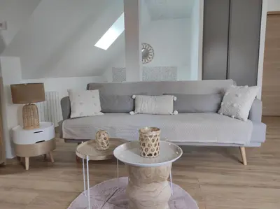 Coin salon dans l'établissement Studio cosy spacieux lumineux avec coin terrasse