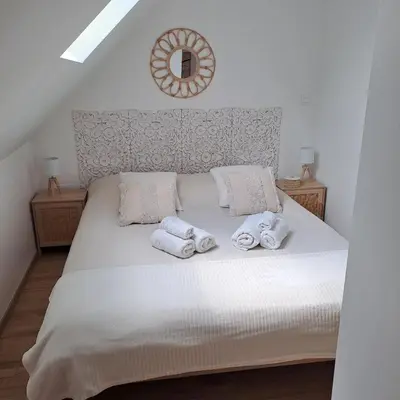 Un ou plusieurs lits dans un hébergement de l'établissement Studio cosy spacieux lumineux avec coin terrasse