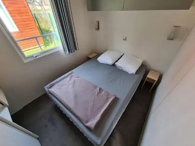 Un ou plusieurs lits dans un hébergement de l'établissement Cute house in Alsace