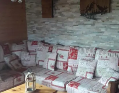 Coin salon dans l'établissement chalet La Vallée