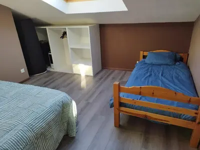 Un ou plusieurs lits dans un hébergement de l'établissement Appartement avec terrasse 6 personnes PAS DE FETE