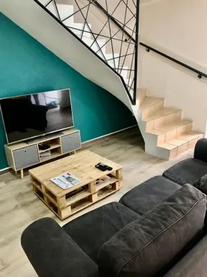 Télévision ou salle de divertissement dans l'établissement Appartement avec terrasse 6 personnes PAS DE FETE