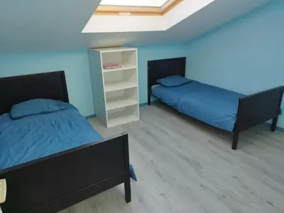 Un ou plusieurs lits dans un hébergement de l'établissement Appartement avec terrasse 6 personnes PAS DE FETE