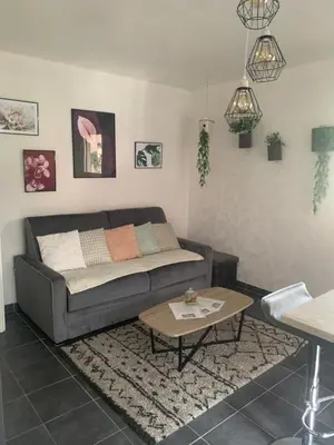 Coin salon dans l'établissement Welcome Appart Colmar
