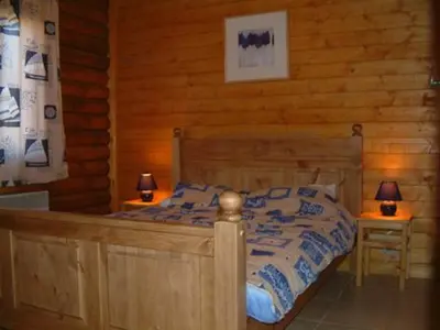 Un ou plusieurs lits dans un hébergement de l'établissement Le Chalet des Vosges