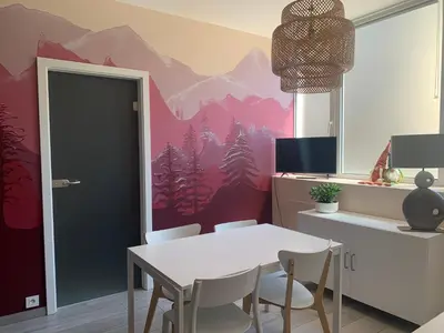Télévision ou salle de divertissement dans l'établissement Au Paradis de la Rivière Joyeuse - Gite avec Terrasse