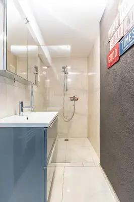 Salle de bains dans l'établissement Le 31-GregIMMO-Appart'Hôtel