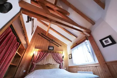 Un ou plusieurs lits dans un hébergement de l'établissement Le Bucheron au cœur du massif des Vosges 3 étoiles