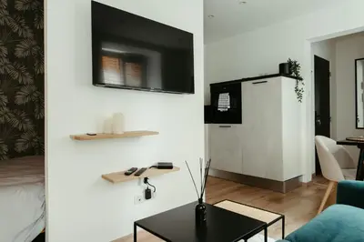 Télévision ou salle de divertissement dans l'établissement La DOLCE Villetta - appartement de Standing