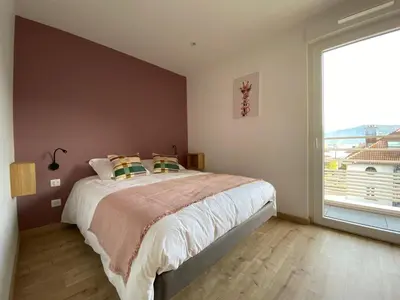 Un ou plusieurs lits dans un hébergement de l'établissement L'Escampette, superbe appartement avec terrasse