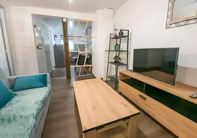 Télévision ou salle de divertissement dans l'établissement L'industr'ILL au cœur De l'Alsace