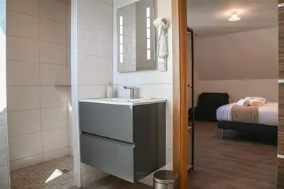 Un ou plusieurs lits dans un hébergement de l'établissement Grande maison de vacances L'Orée des Vignes