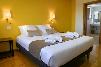 Un ou plusieurs lits dans un hébergement de l'établissement Grande maison de vacances L'Orée des Vignes