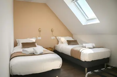 Un ou plusieurs lits dans un hébergement de l'établissement Grande maison de vacances L'Orée des Vignes