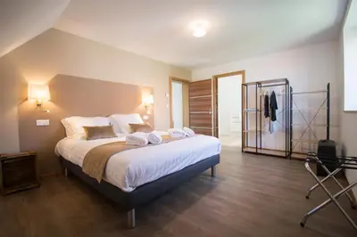 Un ou plusieurs lits dans un hébergement de l'établissement Grande maison de vacances L'Orée des Vignes