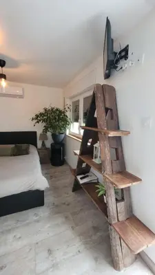Télévision ou salle de divertissement dans l'établissement Savannah