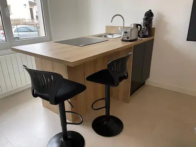 Cuisine ou kitchenette dans l'établissement Le 33