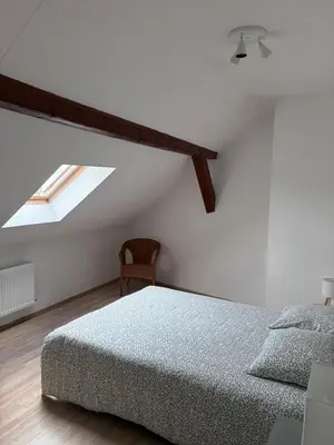Un ou plusieurs lits dans un hébergement de l'établissement Colmar charmant logement