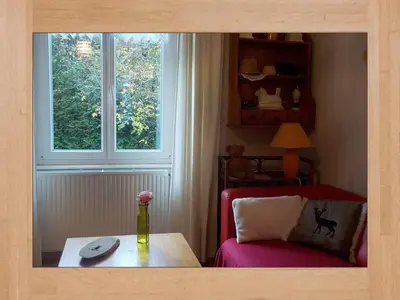 Coin salon dans l'établissement LES LILAS