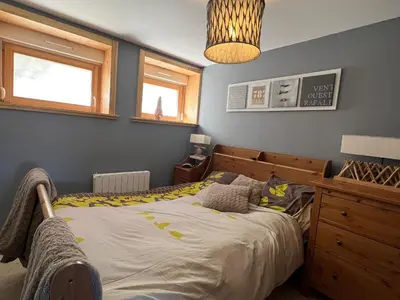 Un ou plusieurs lits dans un hébergement de l'établissement Appartement cosy à La Bresse avec terrasse, proche des pistes et équipements tout inclus - FR-1-589-407